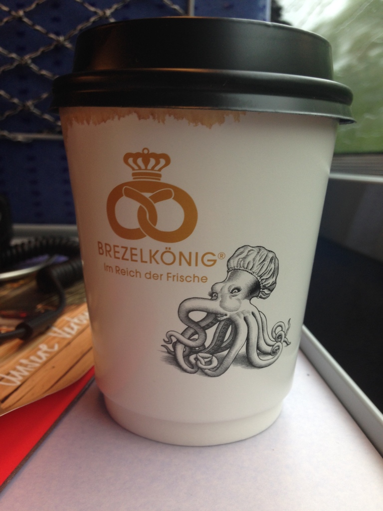 Coffee en route, featuring an anthropomorphised octopus which I consider to be more menacing than is necessary